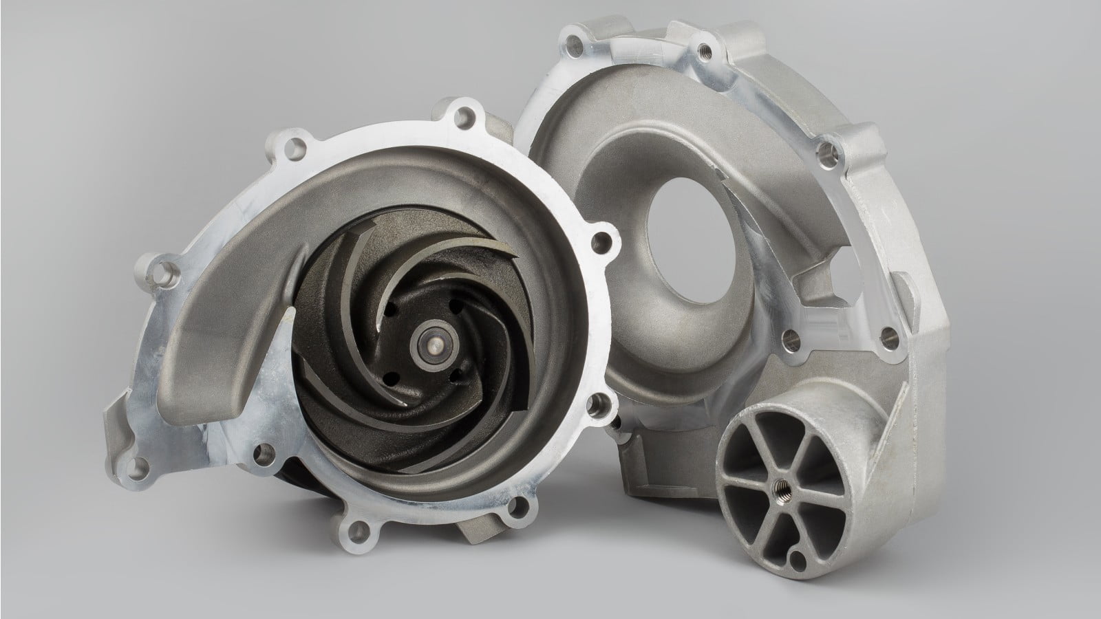 yellow sports car driving down road